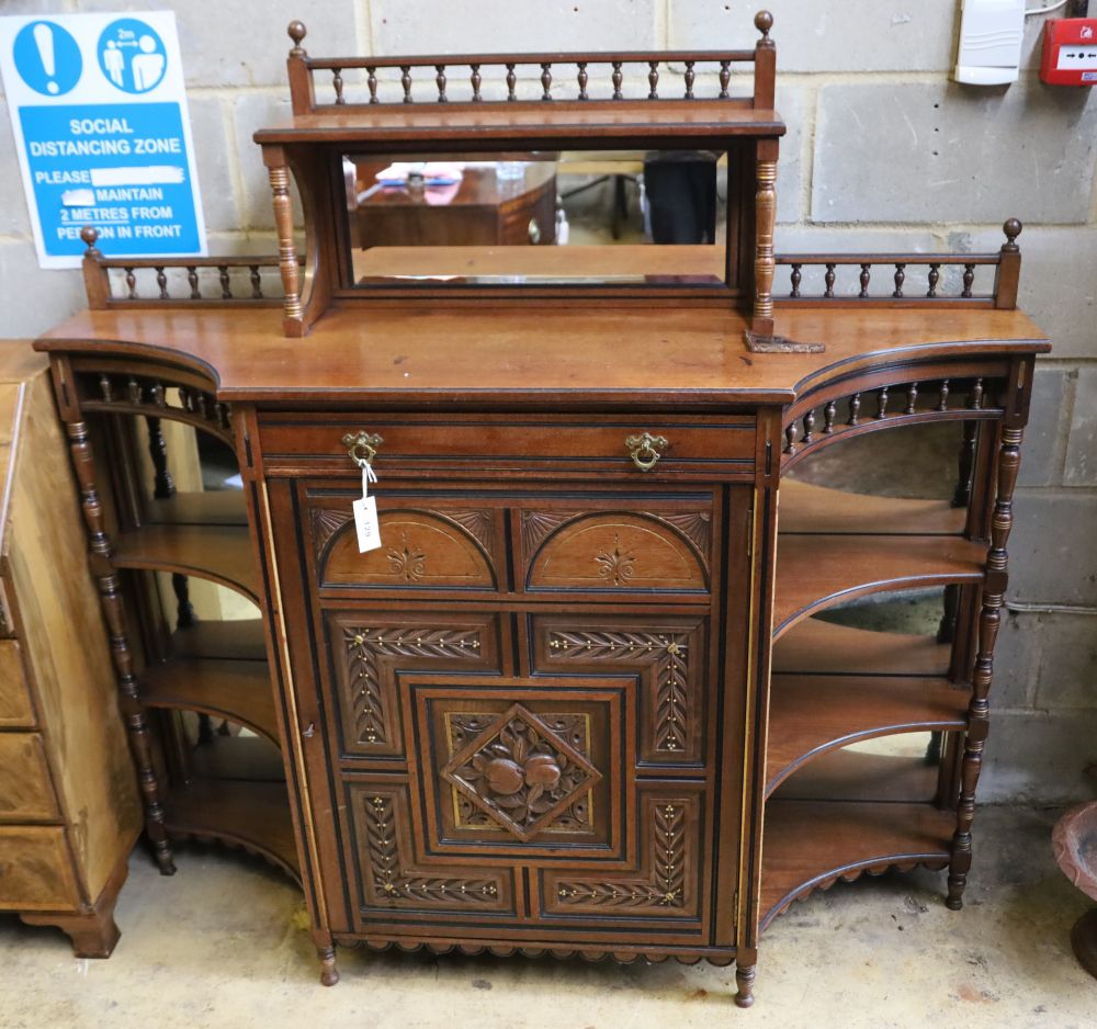 A late Victorian aesthetic movement mahogany side cabinet, width 150cm, depth 43cm, height 147cm